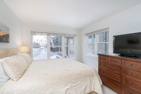 Primary bedroom features a queen bed..