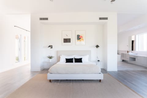 Master bedroom features a king bed.