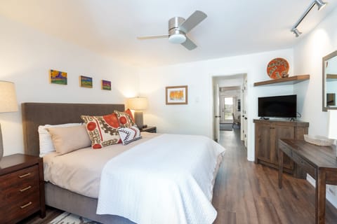 Primary bedroom features a king bed.