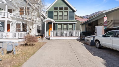 Charming Telluride home with a welcoming front porch and mountain views.