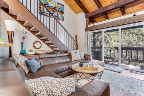 Sit down and relax in this spacious living room.