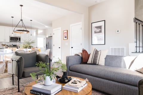 Living area is chic and bright.