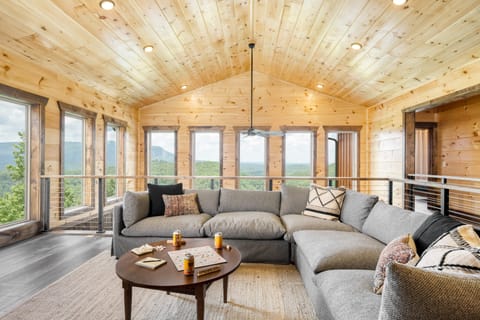 Large windows with stunning mountain views.