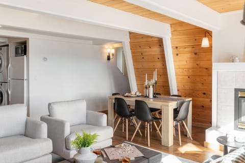 The living room seamlessly adjoins the inviting dining area.