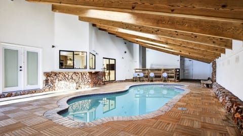 Welcome to Honeypot! Lakefront home with large indoor pool to enjoy a swim any time of the year.