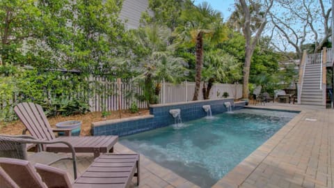 Relaxing pool with cascading waterfalls.