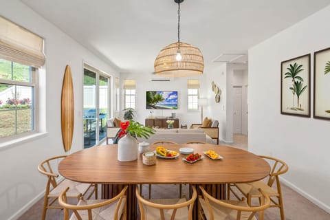 Spacious kitchen features barstool seating and updated appliances. Easily keep everyone's favorites stocked with grocery shopping just 10 minutes away.