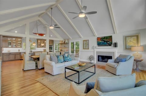 Stunning living area with high ceilings.
