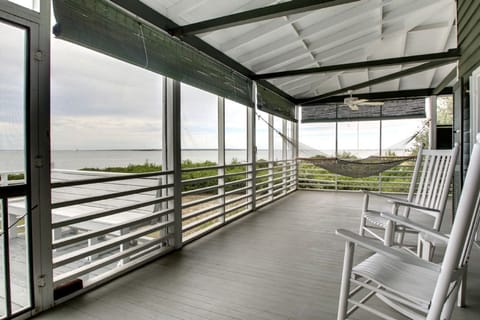 Screen porch. Catch the SW breeze.