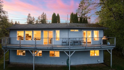 Exterior featuring a large wrap-around deck.