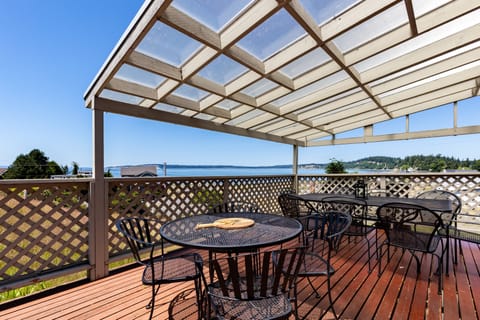 Enjoy a sun-soaked deck made for delightful dining.