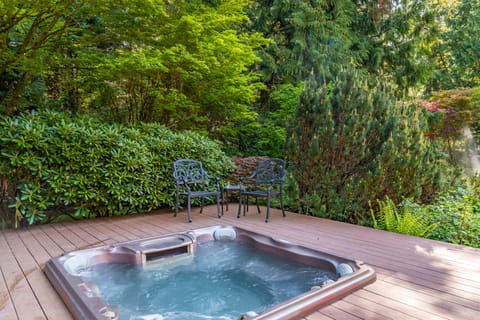 Basking in the bliss of hot tub and greenery.