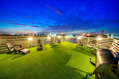 Rooftop dining and grilling delights.