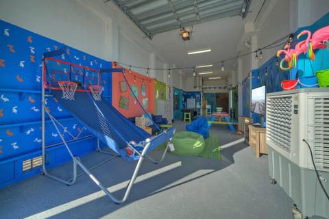 Game room set up in the garage.