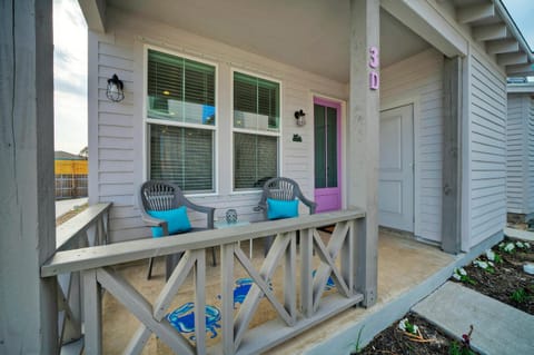 Double the comfort, double the charm on this cozy porch.