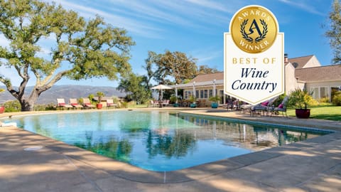 Nestled right next to a vineyard.