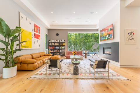 Expansive pocket doors create seamless indoor-outdoor living.