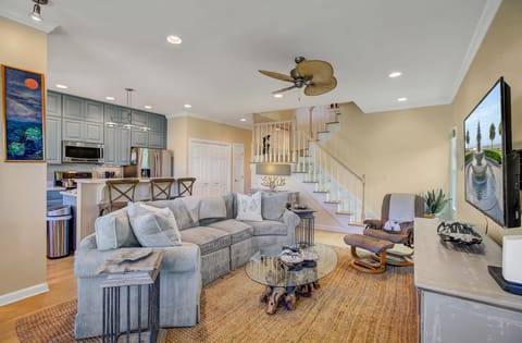 Open concept floor plan, modern appliances.