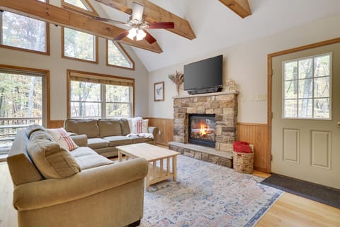 Light and airy living space with a fireplace.