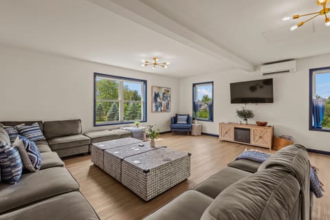 Spacious living area features a large sectional.