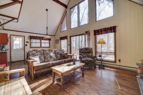 A cozy living room nestled in woodsy charm.