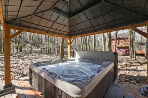 Hot tub nestled in the woods.