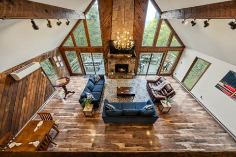 Cozy living room with a fireplace and TV.