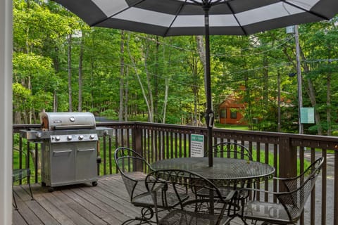 Stay cool under the shade of the umbrellas while enjoying the fresh air on this deck.