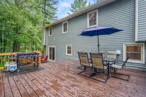 Chilling deck, complete with an outdoor dining table and BBQ grill.
