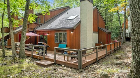 Cabin exterior showing entrance deck and outdoor seating area
