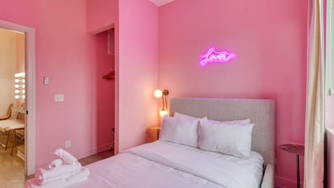 Primary Bedroom features a king bed with an ensuite bathroom.