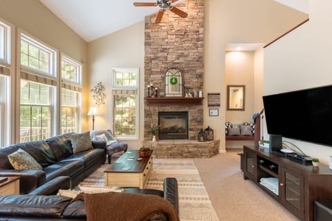 Spacious living room featuring a fireplace perfect for relaxation.