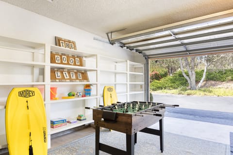 Challenge friends to a foosball match in the garage.