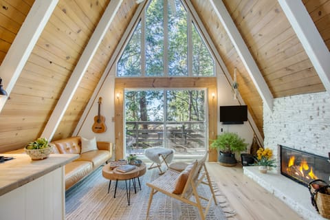 Renovated A-frame with tons of natural light and woodland views.