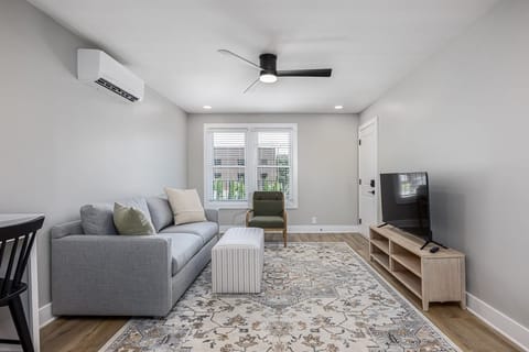 1BR - Living room with sleep sofa.