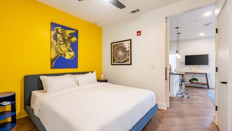 The bedroom features a king bed and an ensuite bathroom.