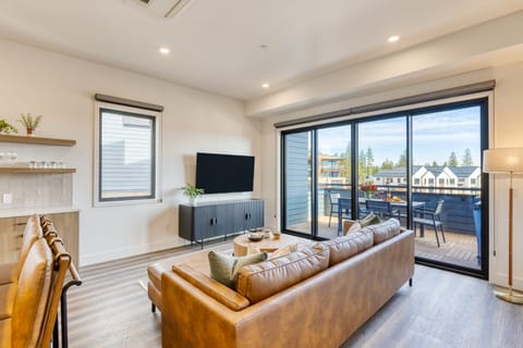 The primary bedroom features a king bed, ensuite bathroom and access to the balcony.