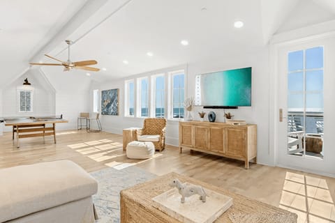 Challenge your friends to a fun game of ping pong in this bright and airy room!