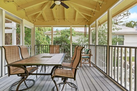 Screened-in Porch for an all-weather dining area with a view.