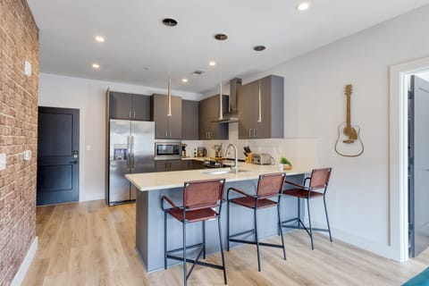 Sleek, fully equipped kitchen.
