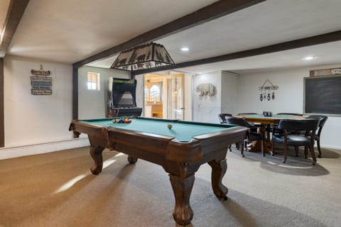 Game room fun! Pool table, poker, foosball, and vintage arcade vibes