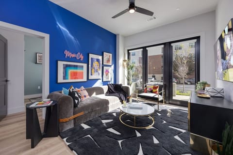 Primary bedroom features a king bed, TV, and ensuite bathroom.