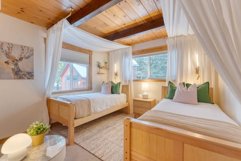 Bedroom 3 features two twin beds.