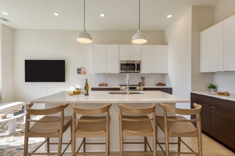 Sleek, fully equipped kitchen.