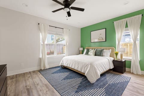 The primary bedroom features a king bed.