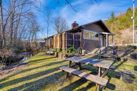 Primary bedroom in the main house features a king bed and TV.