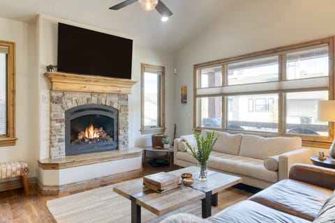 Living room offers a fireplace and TV.