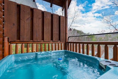 Relaxing hot tub with breathtaking mountain views.