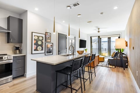 Kitchen countertop and barstool seating.