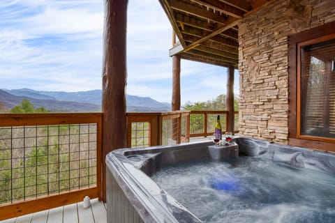 Private hot tub with mountain views.